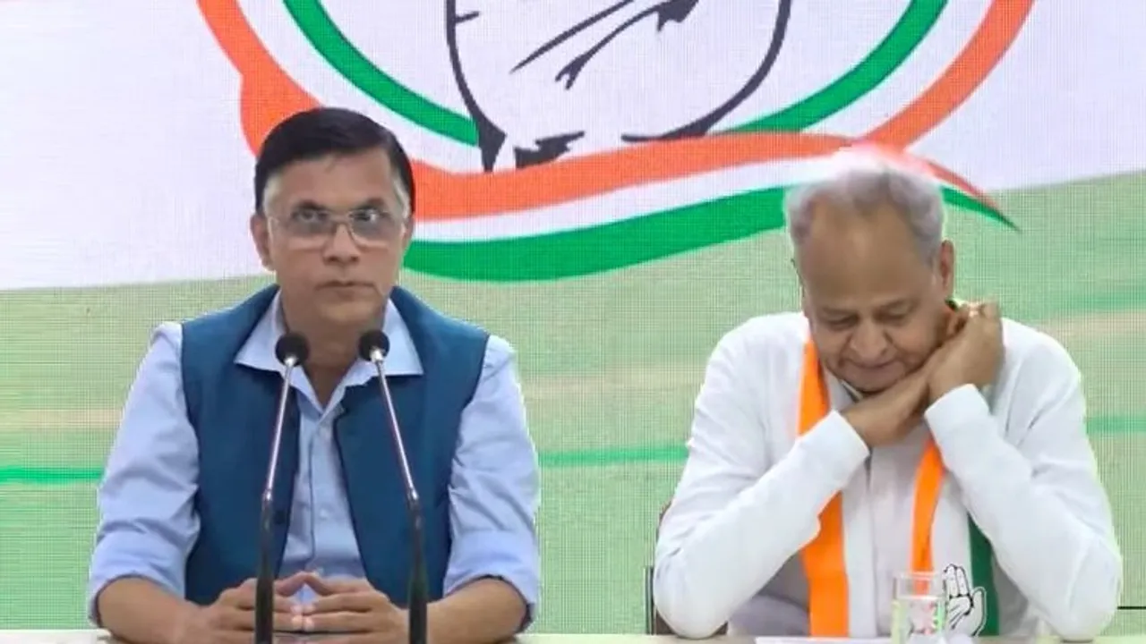 Pawan Khera and Ashok Gehlot addressing a press conference