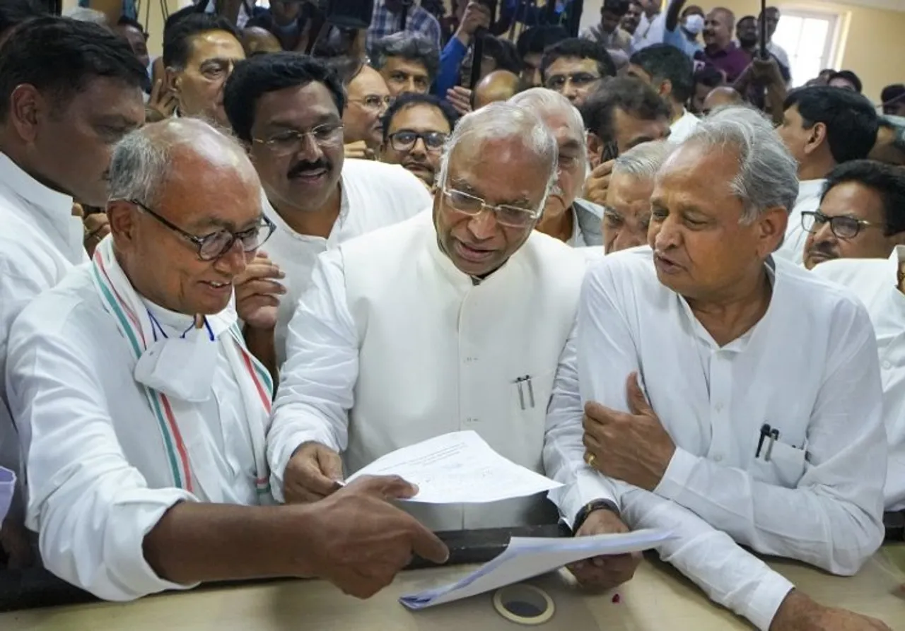 Senior Congress leader Mallikarjun Kharge files his nomination papers for the post of party President, at AICC headquarters in New Delhi, Friday, Sept. 30, 2022. Congress leaders Digvijaya Singh, Ashok Gehlot and others are also seen