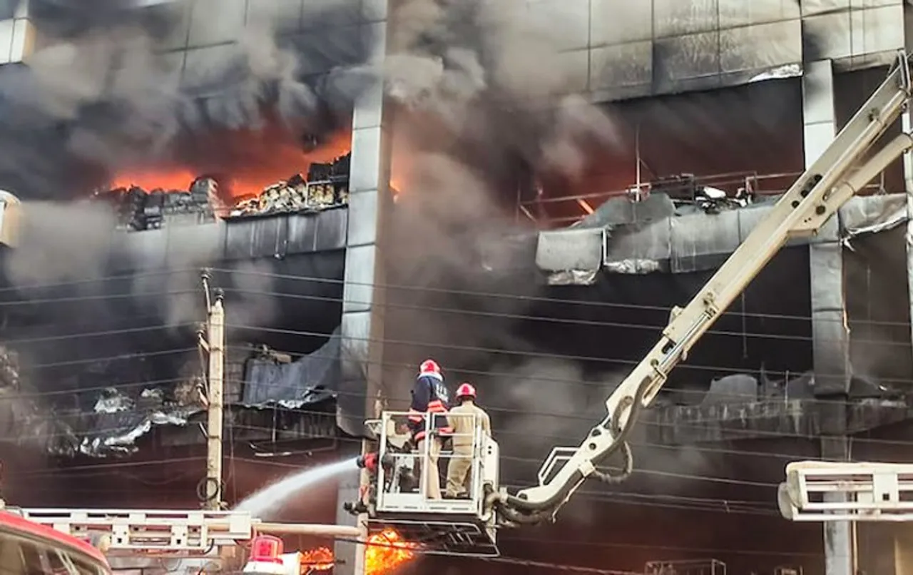 Scenes of death and despair, many jump from building to escape blaze