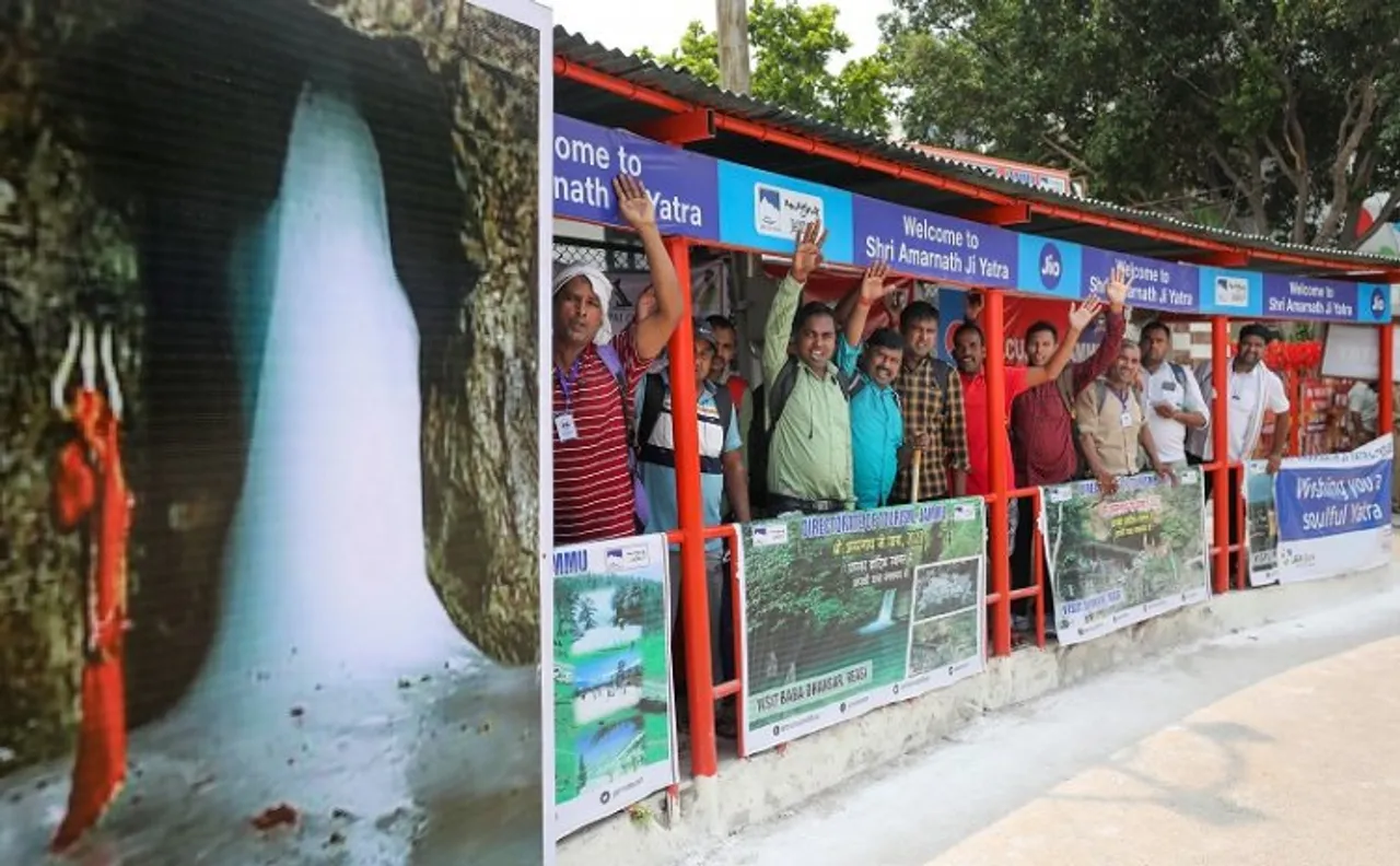 Amarnath pilgrims arrive at Bhagwati Nagar base camp, ahead of the commencement of the Amarnath Yatra 2022, in Jammu