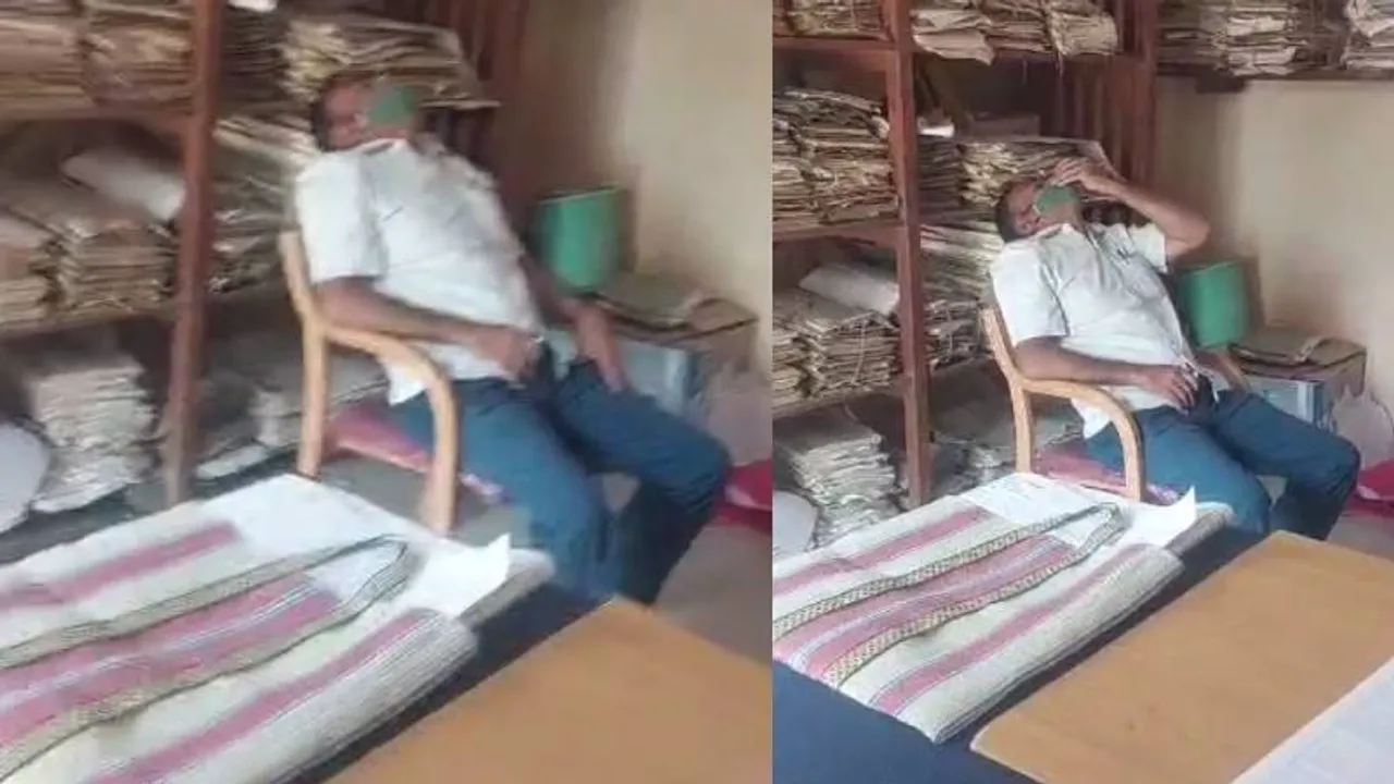 ಚಿಂತೆ ಇಲ್ಲದವನಿಗೆ ಸಂತೆಯಲ್ಲೂ ನಿದ್ದೆ.. ಕಚೇರಿಯಲ್ಲಿ ಗಡದ್ದಾಗಿ ನಿದ್ದೆ ಹೊಡೆಯುವ ಅಧಿಕಾರಿ; ರೈತರ ಆಕ್ರೋಶ