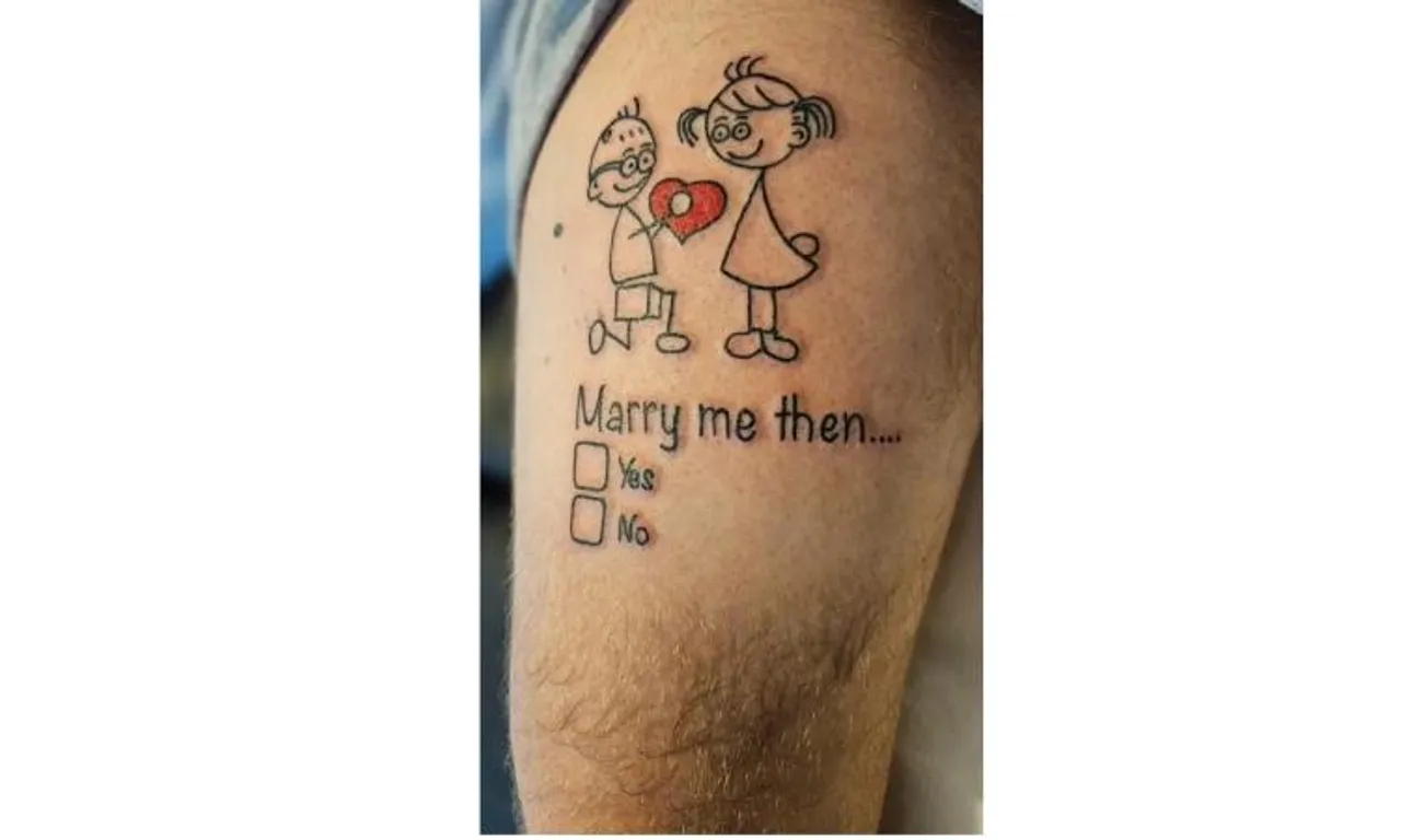 UK barber proposes to his girlfriend with 10 inch tattoo on his upper-left thigh