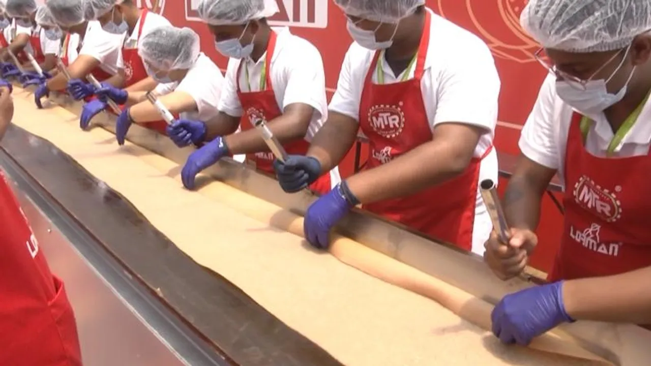 MTR creates history with its 123 foot-long dosa!