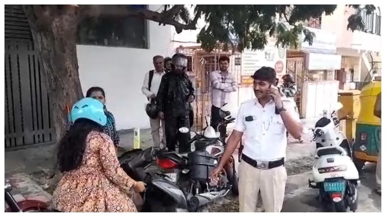 Bengaluru: Woman clashes with traffic police over helmet fine and flees scene in Magadi Road