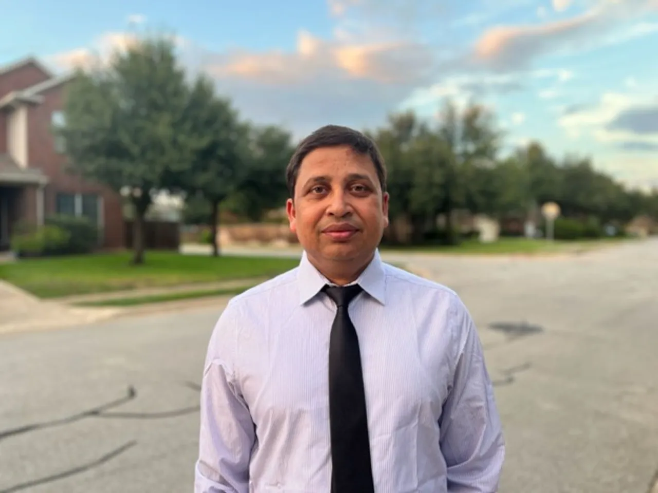 Amit leading a diverse team, bridging technical and business strategy with AI-powered tools and collaboration.