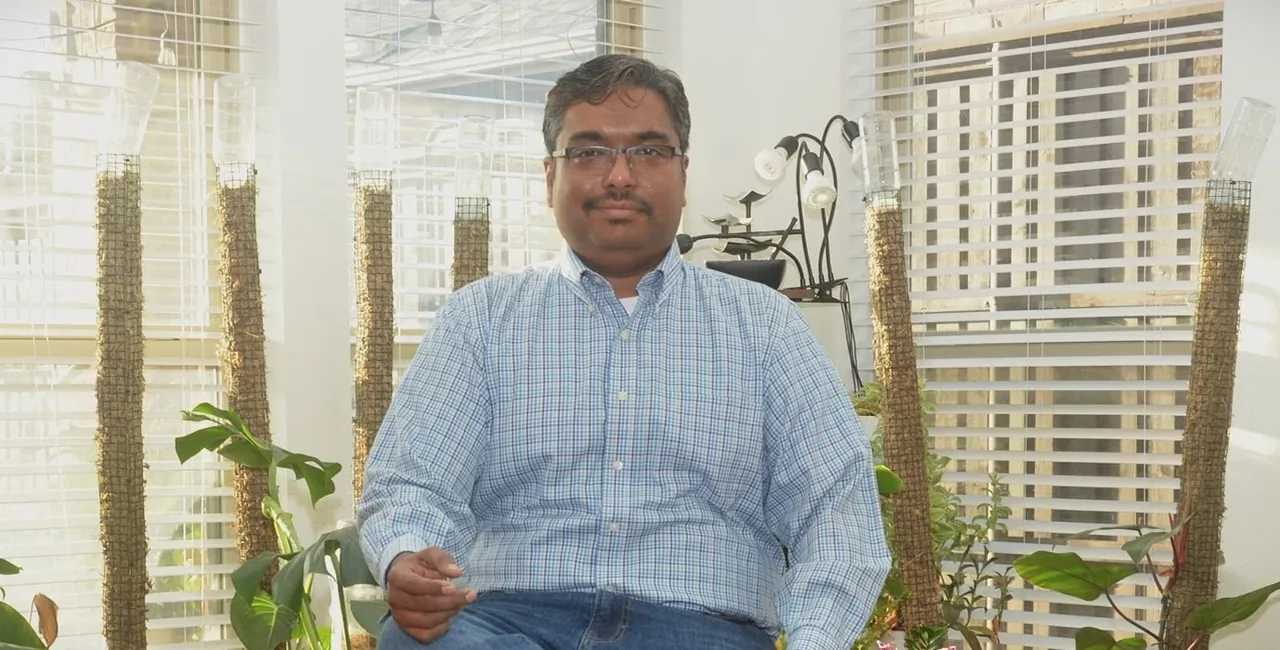 Automotive DevOps pipeline showing bi‑weekly production-like merges, QA gates, and controlled promotions to production.