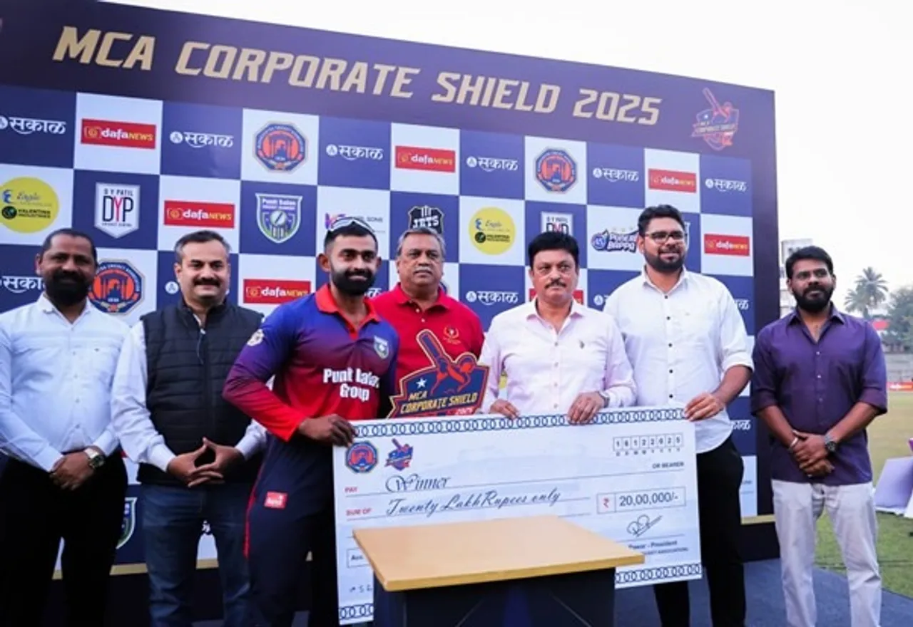 Punit Balan Cricket Academy lifting MCA Corporate Shield 2025 trophy after beating Kapil Sons by 89 runs