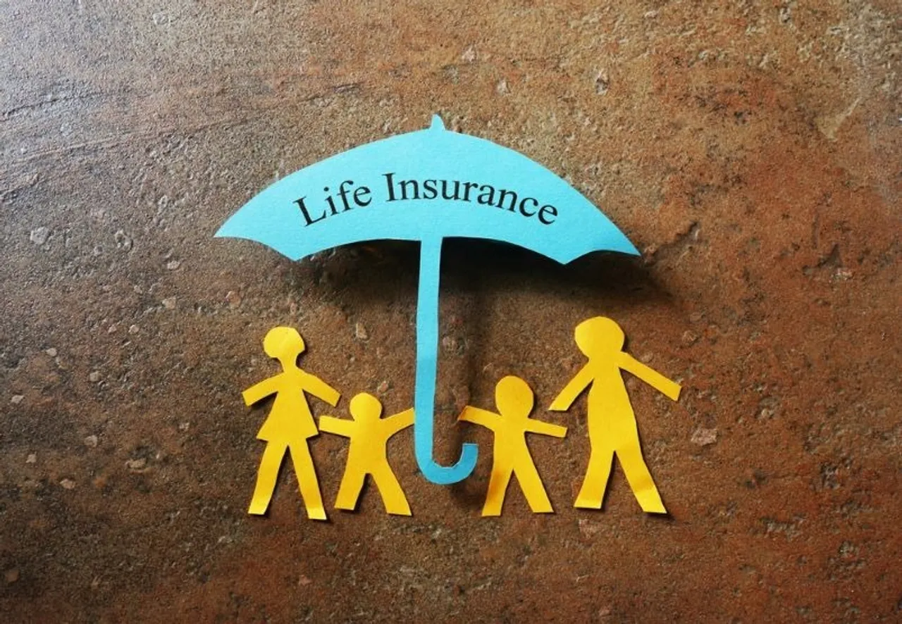Term life insurance policy document showing Section 80C tax deduction and tax-free death benefit payout