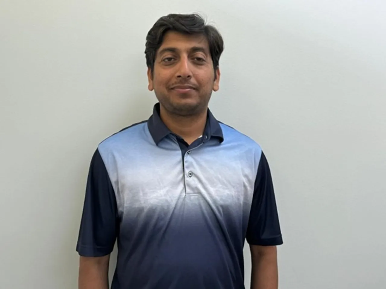 Vimal Patel working on dietary supplement formulation with regulatory documents and global market research materials