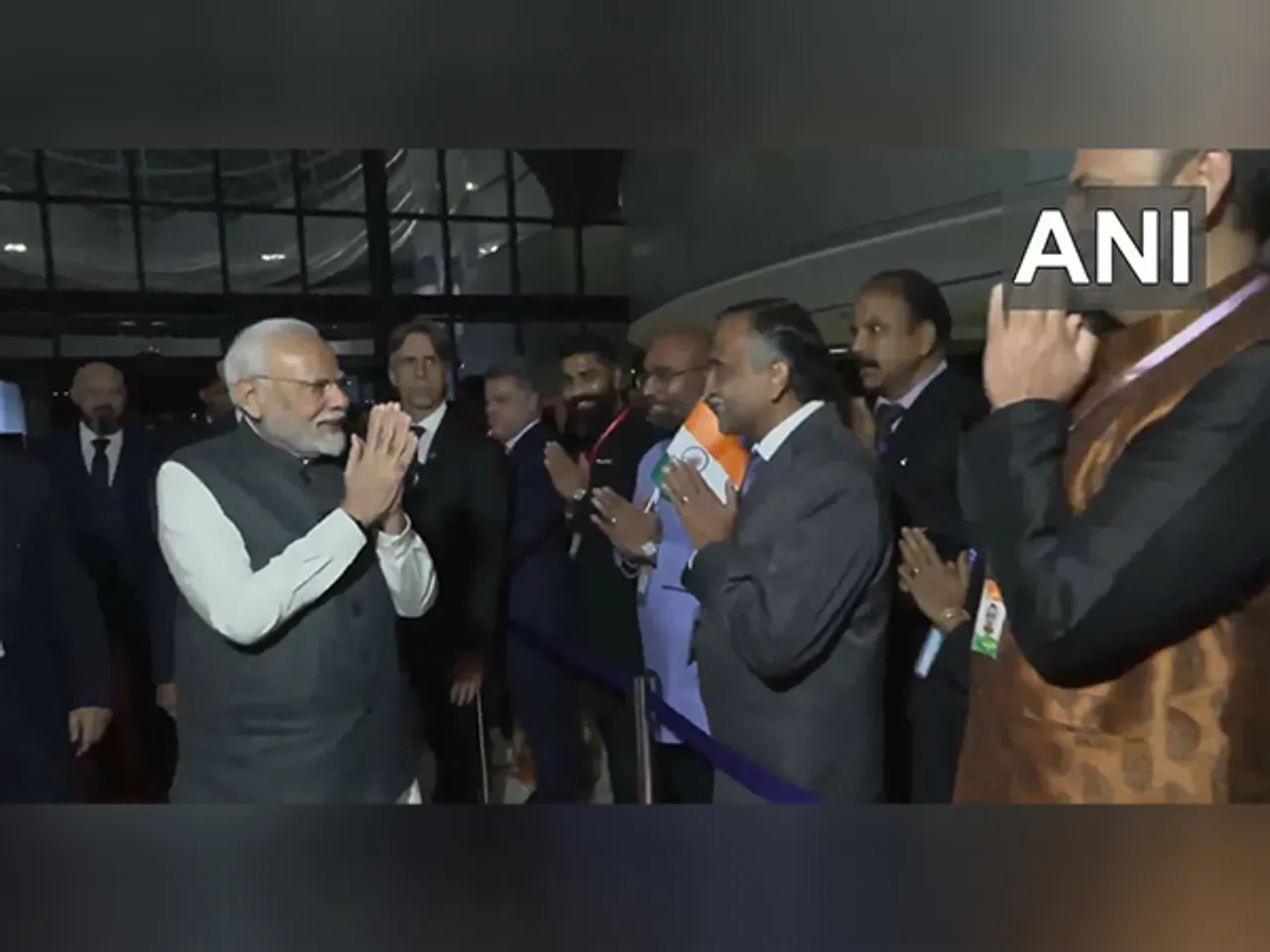 Members of Indian diaspora welcome PM Modi at hotel in Brasilia (Photo Credit: ANI/DDNews)