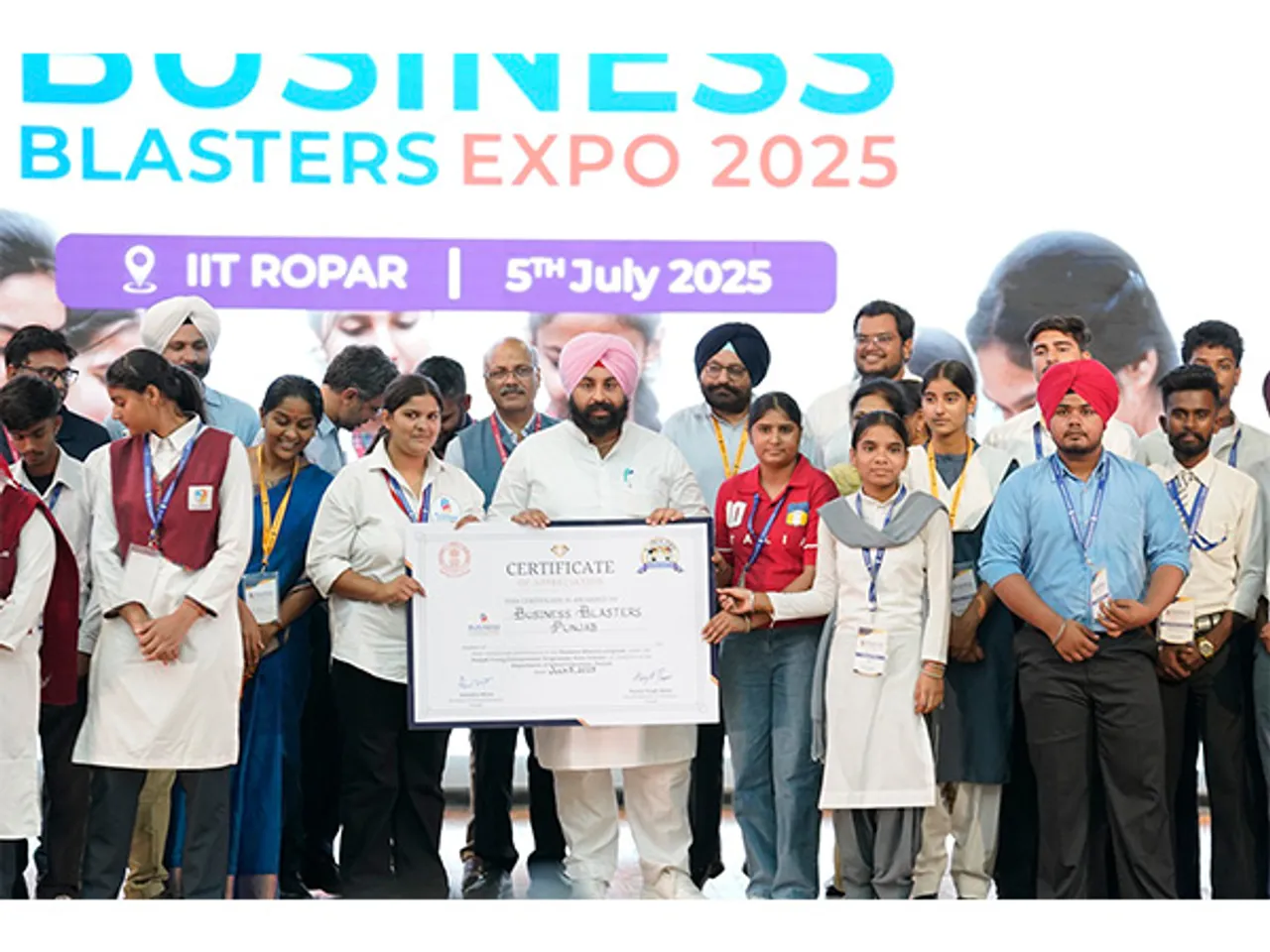 "Punjab Education Minister Harjot Singh Bains with student entrepreneurs at Business Blasters Expo 2025 at IIT Ropar."