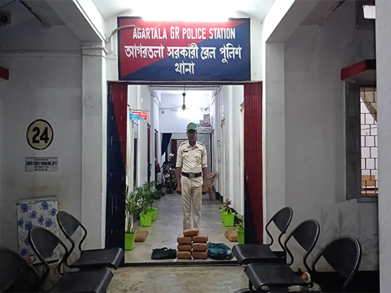 Railway Police personnel with seized 9.5 kg of dry ganja. (Photo/ANI)