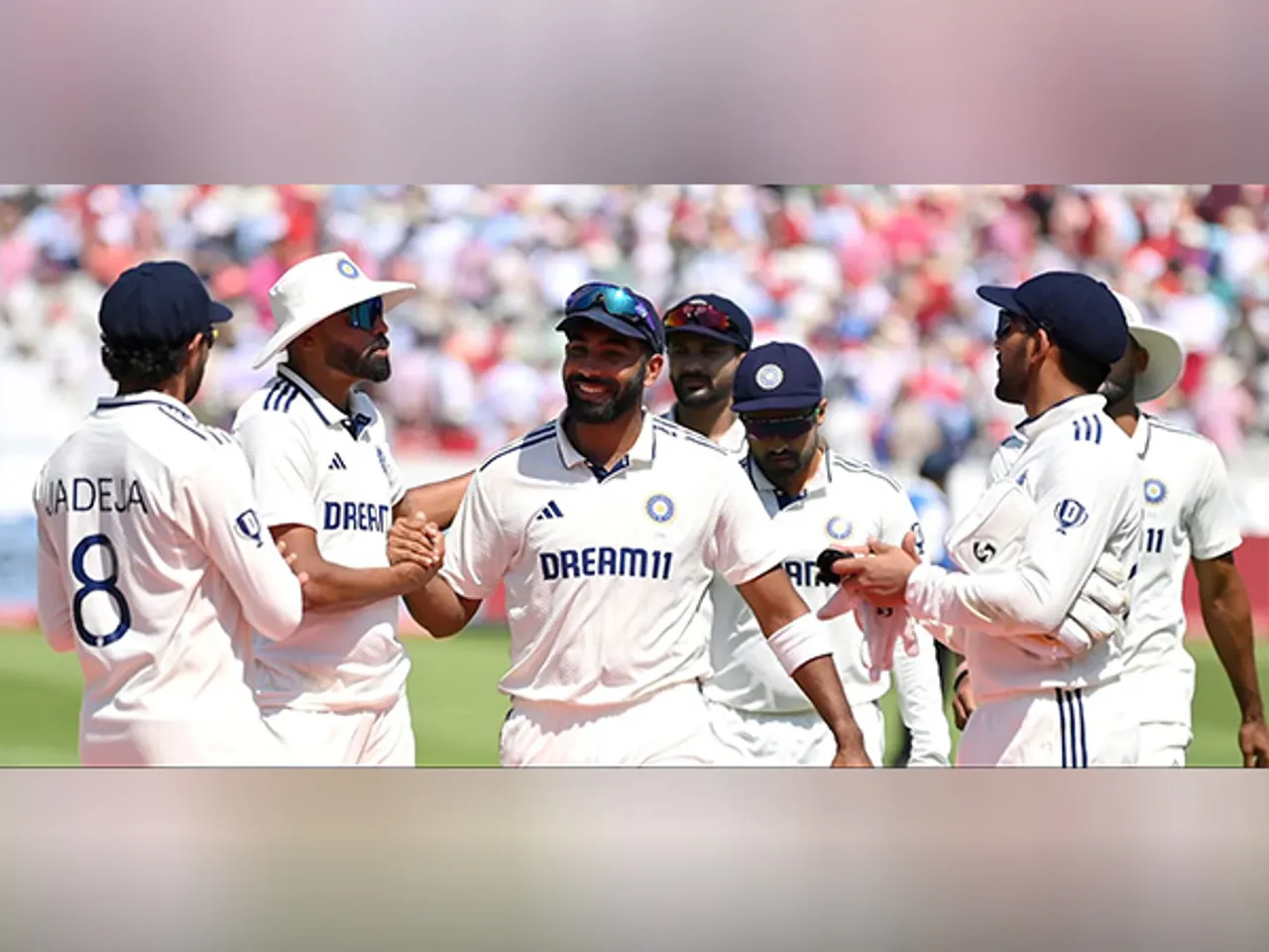Mohammed Siraj and Jasprit Bumrah with Team India