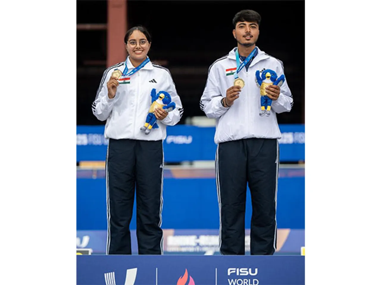 India's compound mixed team archery of Parneet Kaur (L) and Kushal Dalal (R) with gold medal (Photo: X/@Media_SAI)