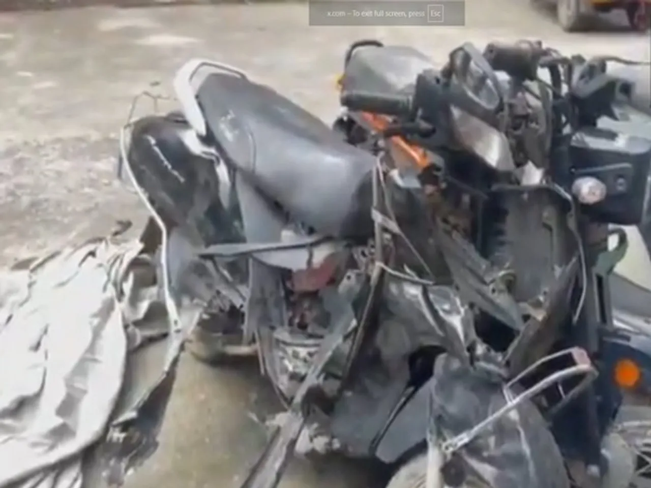 The mangled two-wheeler involved in the accident in Noida on July 26 (Photo/ANI)