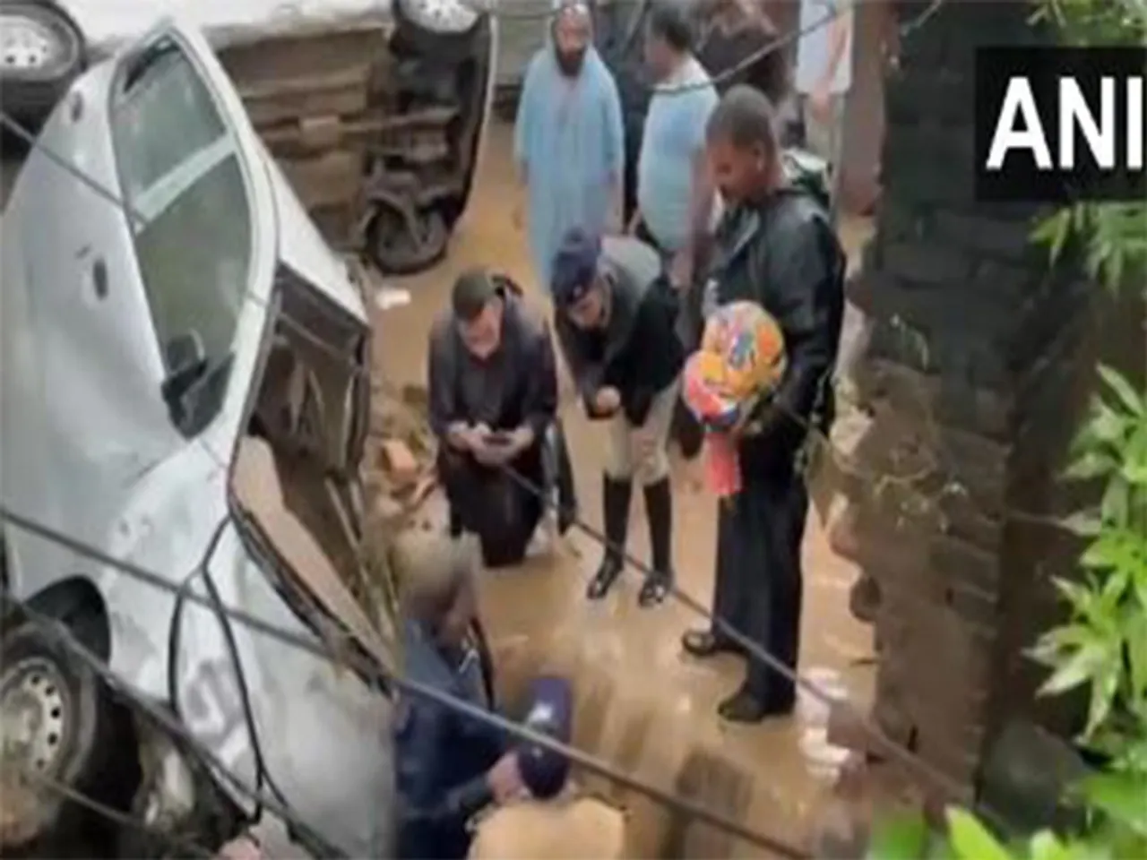 Rescue teams conduct search operations in flood-hit Mandi, Himachal Pradesh (Photo/ANI)