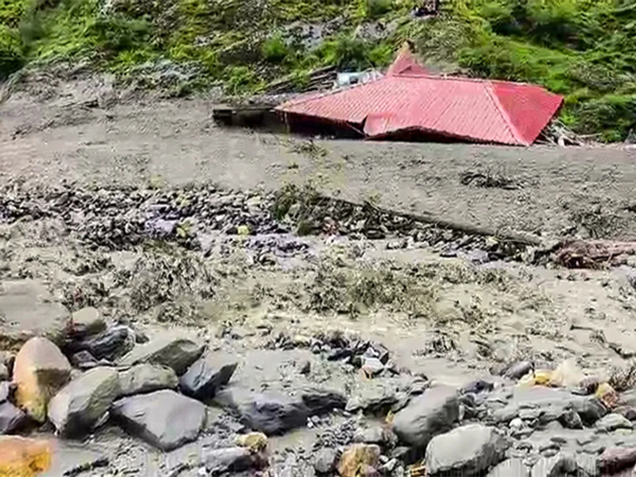 A view of mudslide that struck Dharali following a cloudburst (Photo/ANI)