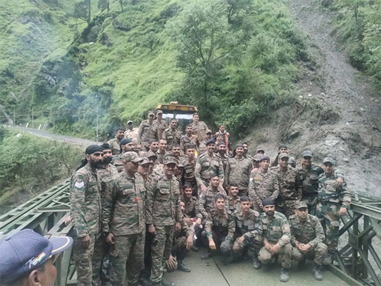 BRO officials after the completion of Bailey bridge. (Photo/ANI)