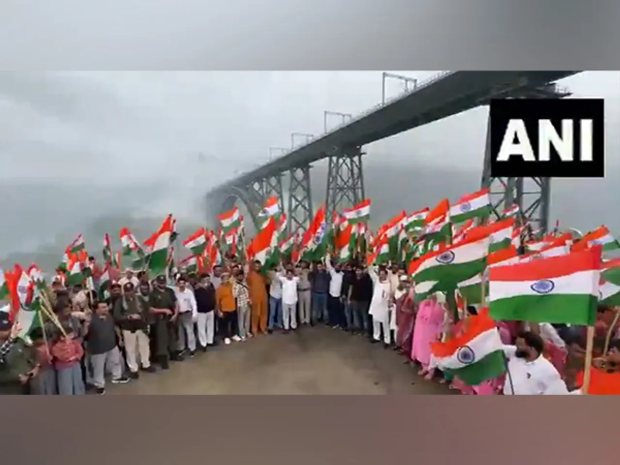Local residents held a Tiranga rally near Chenab Bridge in Reasi (Photo/ANI)