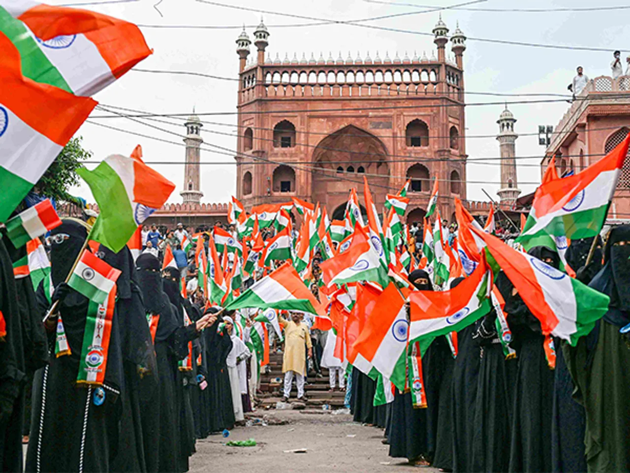 Women wave the Tricolour outside Jama Masjid in New Delhi - Representational Image  (Photo/ANI)