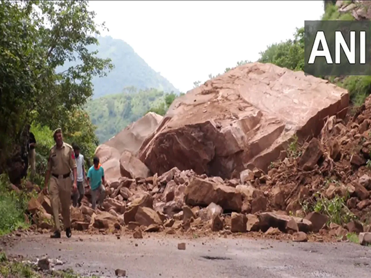 Dhar road linking Lakhanpur and Udhampur in Udhampur's Darsoo area blocked after massive boulder falls; clearance operation underway. (PhotoANI)