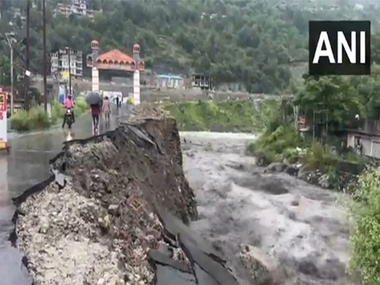 Himachal Pradesh rainfall: Road damaged near Bhoothnath bridge over raging Beas river in Kullu. (PhotoANI)