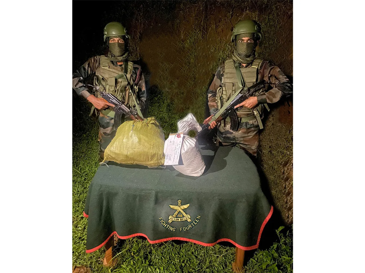 Assam Rifles with the seized Methamphetamine tablets. (Photo/ANI)