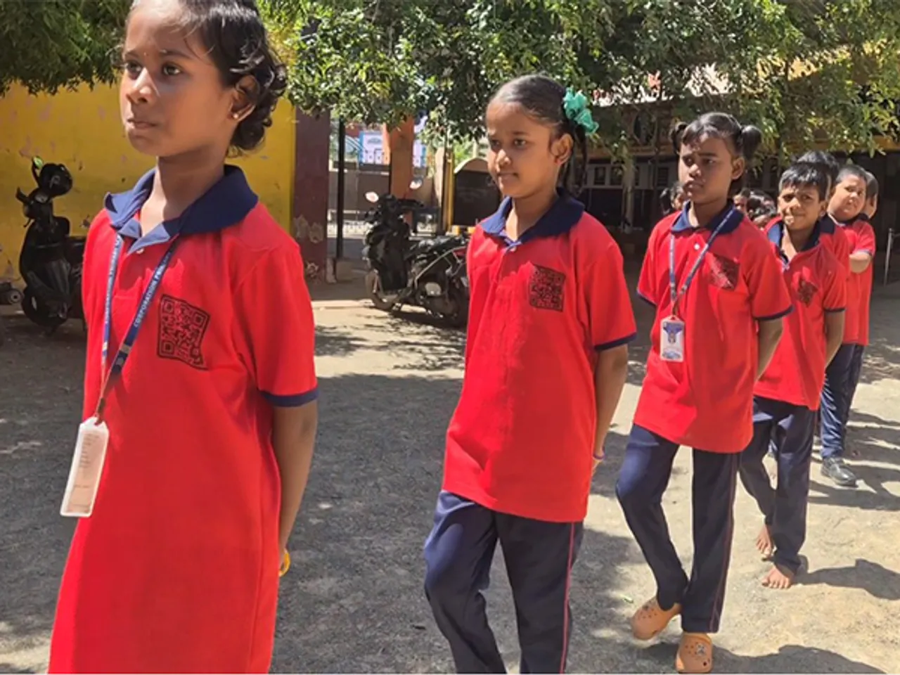 Students wearing uniform with QR code (Photo/ANI)