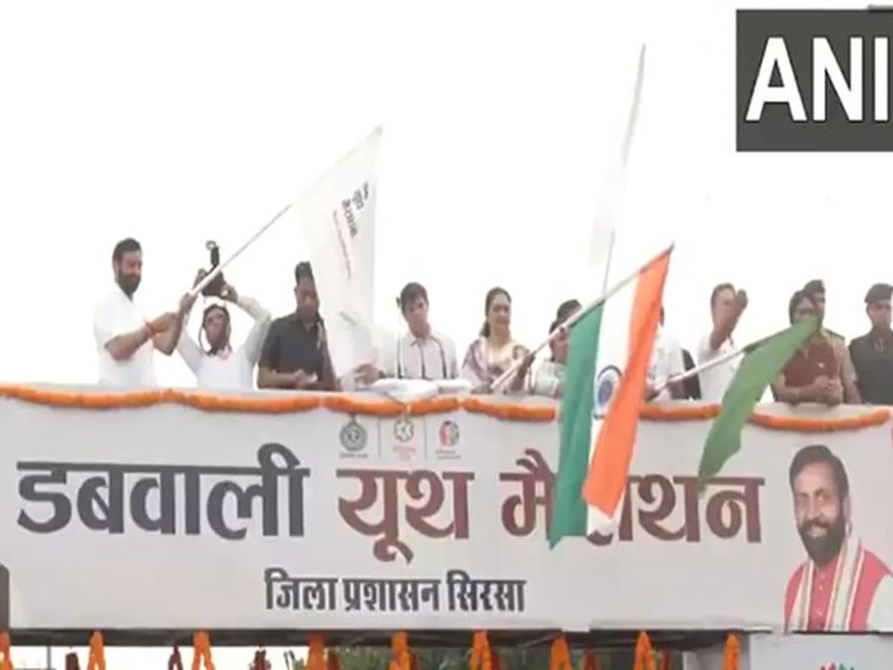 Haryana CM Nayab Singh Saini flagswhile flagging off Dabwali Youth Marathon (Photo: ANI)