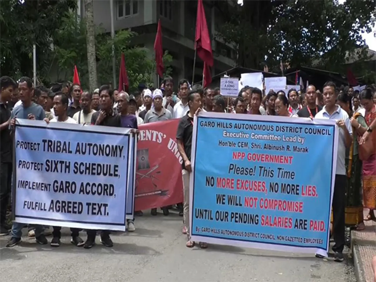 GHADC employees hold a mega protest rally for release of their pending salaries in Tura (Photo/ANI)