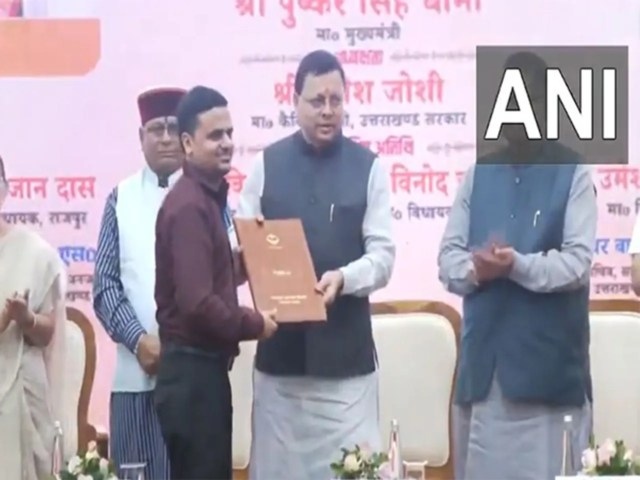 Uttarakhand CM distributes appointment letters to assistant teacher (Photo/ANI)