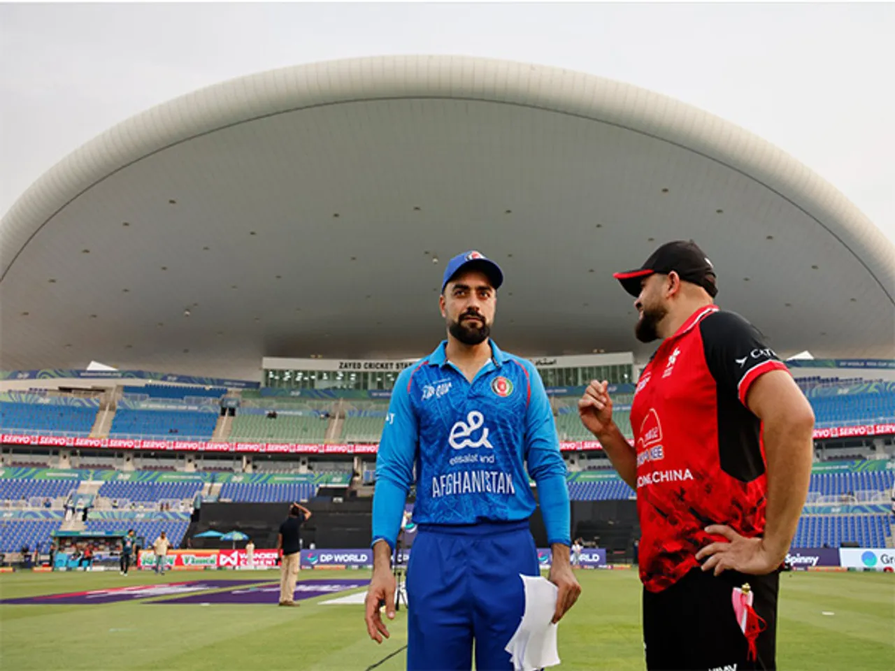 Afghanistan captain Rashid Khan and Hong Kong skipper Yasim Murtaza (Photo: @ACBofficials/X)