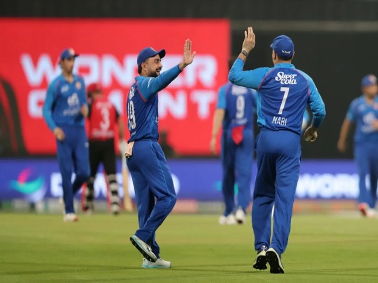 Rashid Khan celebrating with Mohammad Nabi (Photo: @ACBofficials/X)
