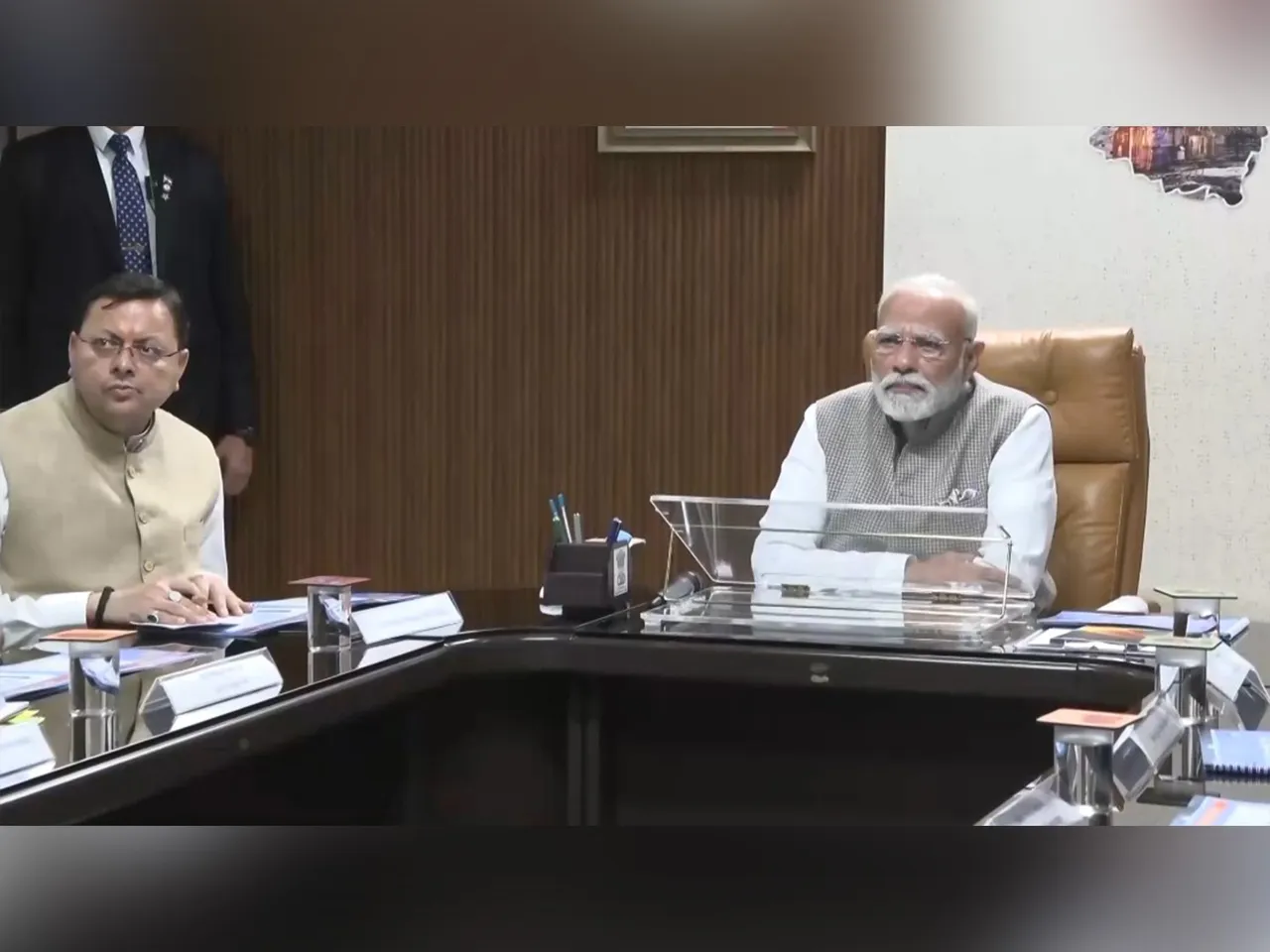 Prime Minister Narendra Modi (right)and Uttarakhand CM Pushkar Singh Dhami (left) (Photo/ANI)