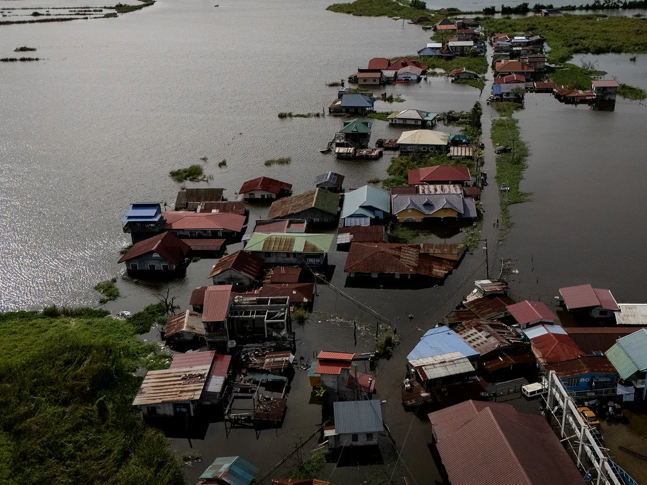A drone view shows homes inundated by high tide and flooding brought by Typhoon Co-may in Calumpit, Bulacan, Philippines in  July 25, 2025. (File Photo/Reuters)
