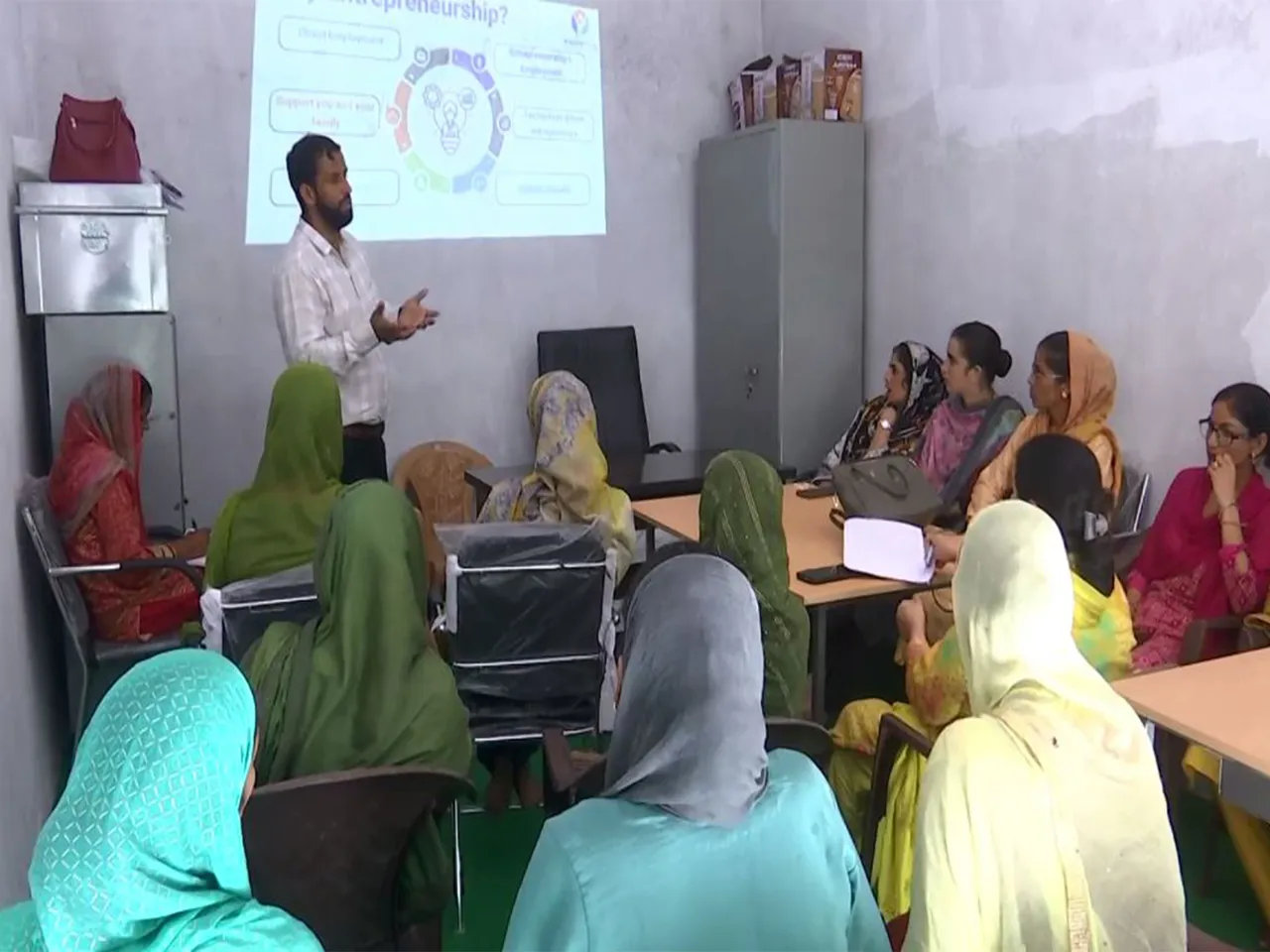 NRLM Block program manager Kamran Hanif interacts with beneficiaries in Rajouri (Photo/ANI)