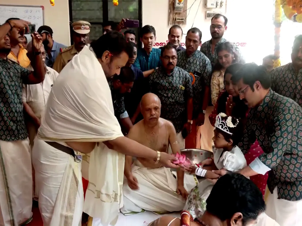 Union Minister Suresh Gopi participates in 'Vidyarambham' celebrations at a temple in Thiruvananthapuram (Photo/ANI)