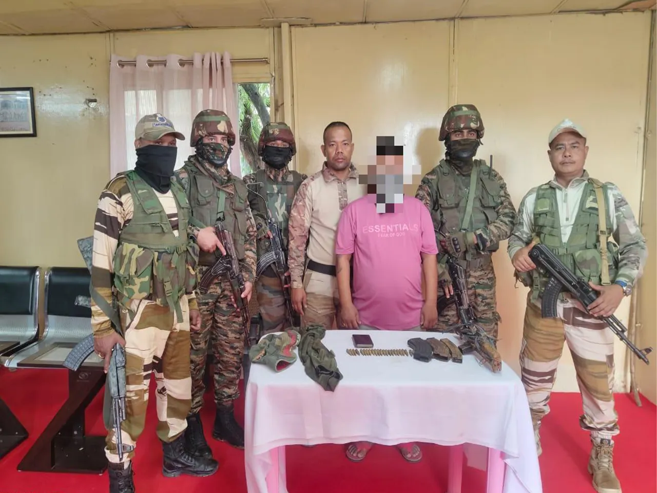 Security Forces with arrested active cadre of KCP (PWG) (Photo/@manipur_police)