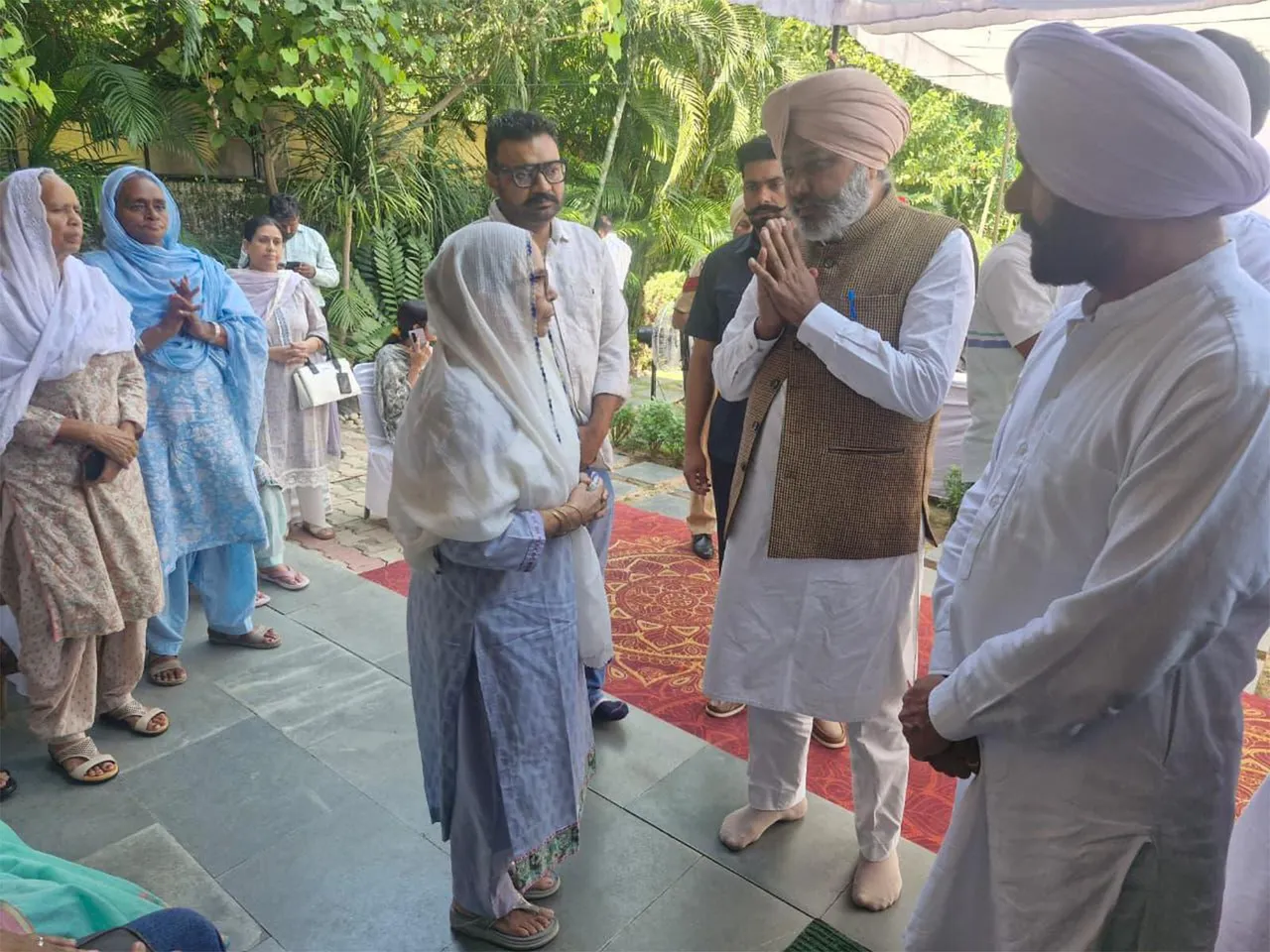 Punjab Finance Minister Harpal Singh Cheema meets with family of late IPS officer Puran Kumar (Photo/ANI)