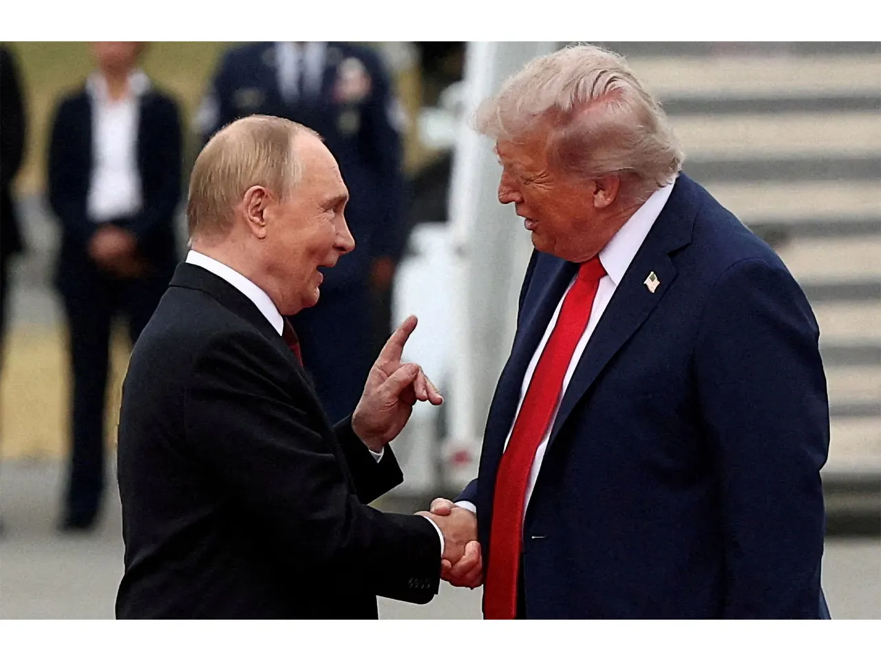 US President Donald Trump shakes hands with Russian President Vladimir Putin during their meeting at Joint Base Elmendorf-Richardson in Anchorage, Alaska. (File Photo/Reuters)