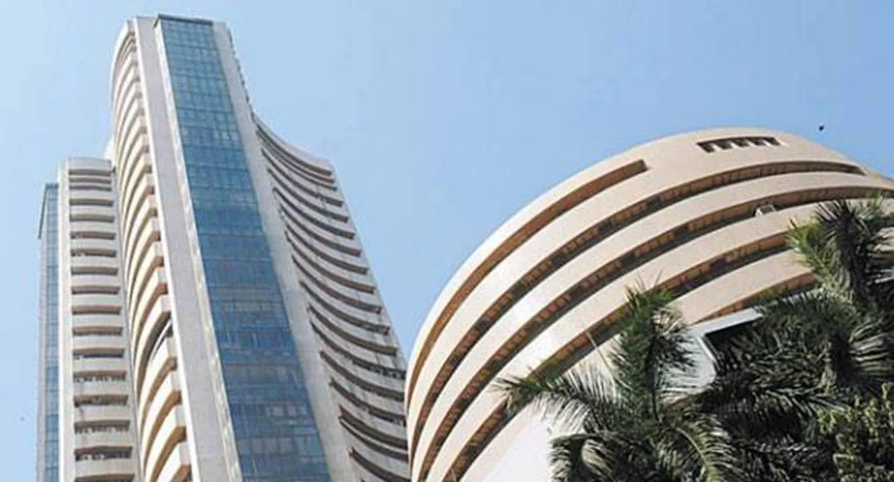 Sensex reverses trend, inches up in late morning deals