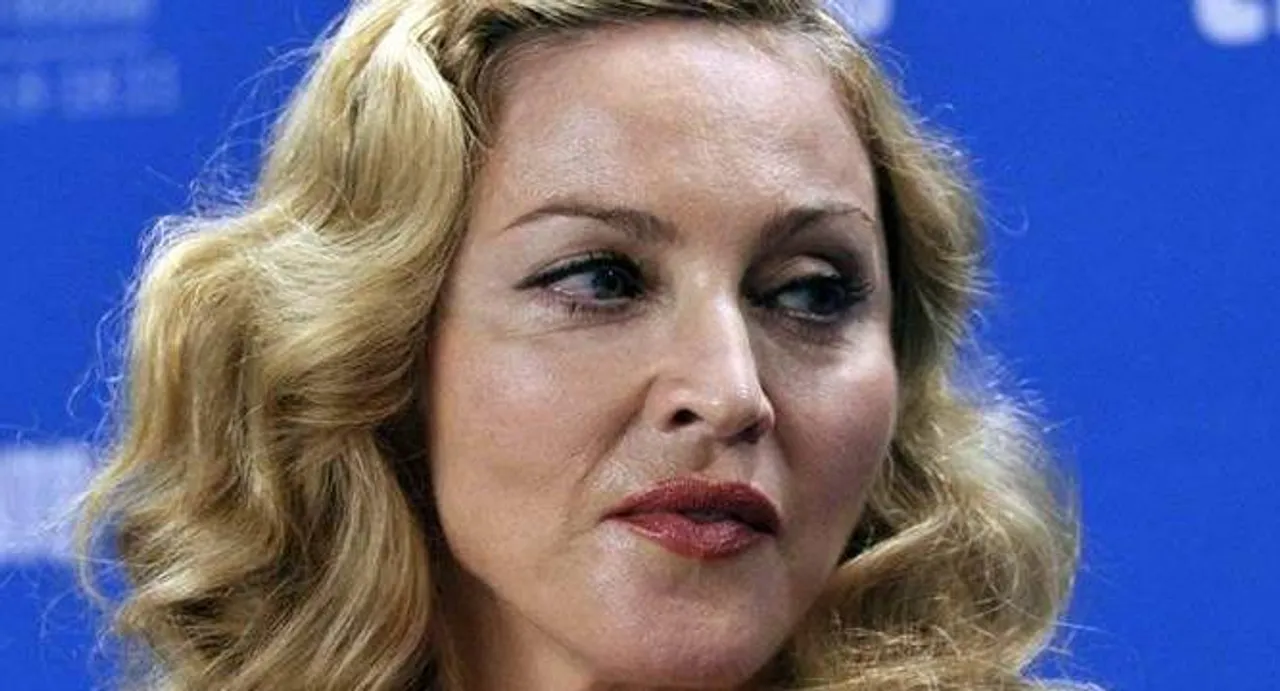 Madonna's son left over phone row?