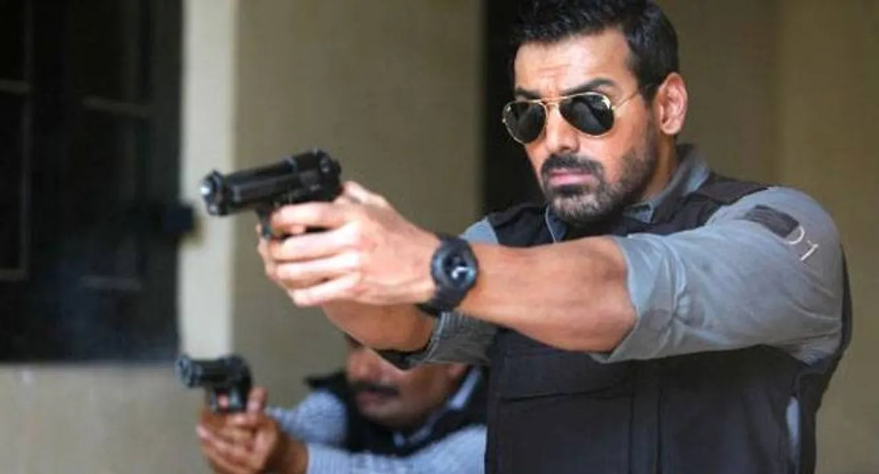 Gun and smiley grip Rocky Handsome's new poster 