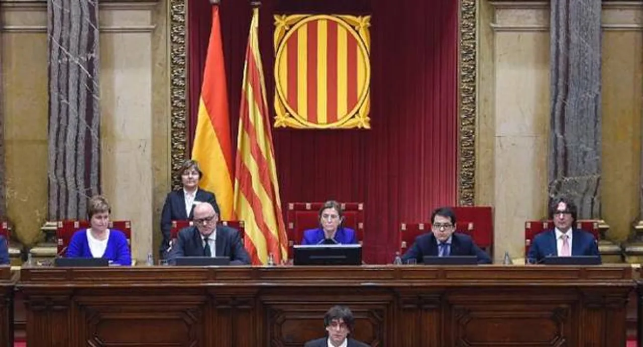 Catalonia elects new leader tasked with breakaway from Spain