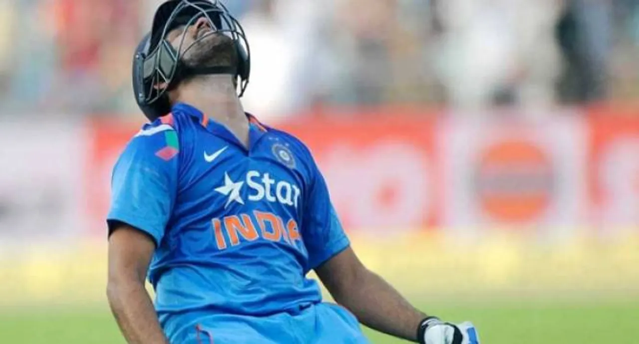 India on losing side; Rohit Sharma enters record books