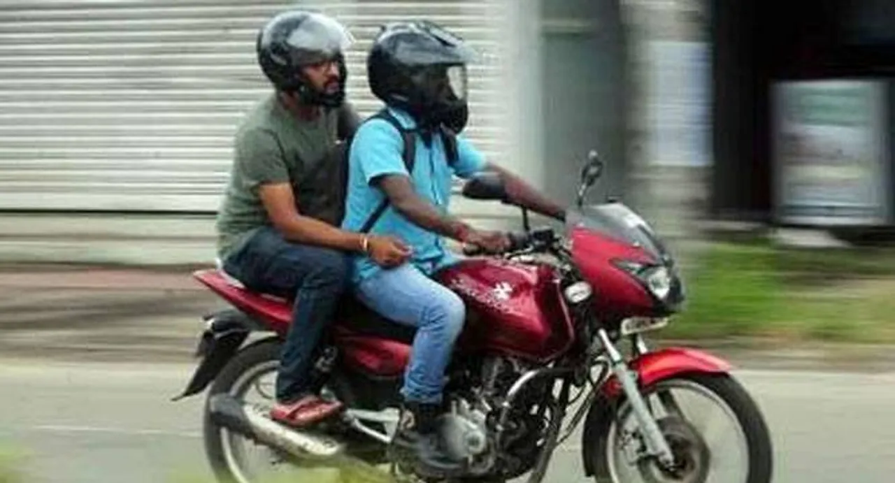 Traffic police seeks citizens' cooperation on helmet for pillions