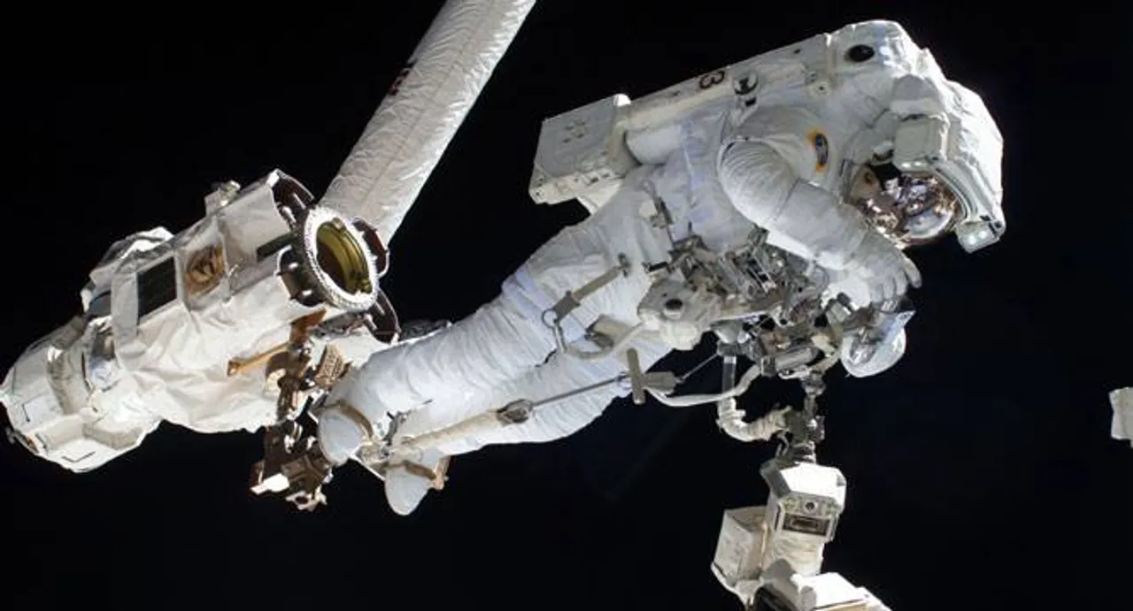 Water in NASA astronaut's helmet cuts short spacewalk