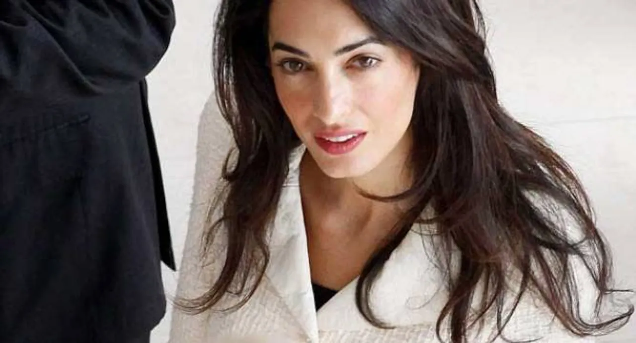 Amal Clooney uses fame for good