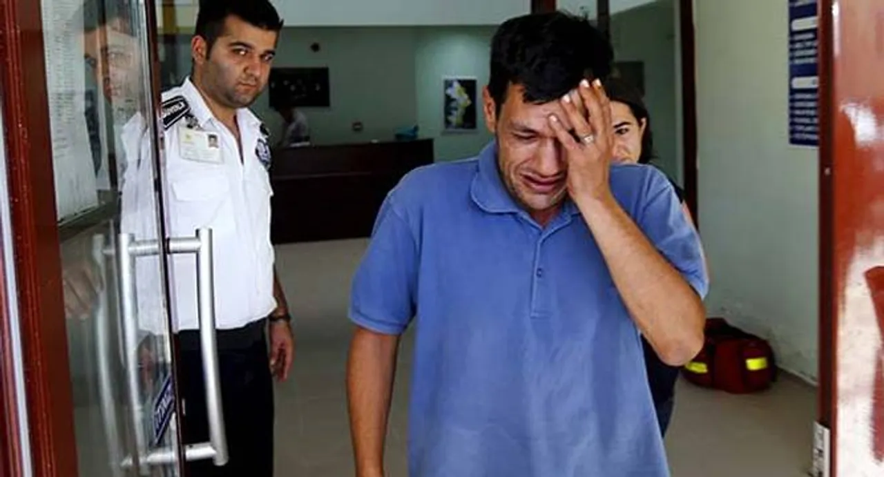 Drowned Syrian toddler's father wept over French cartoon