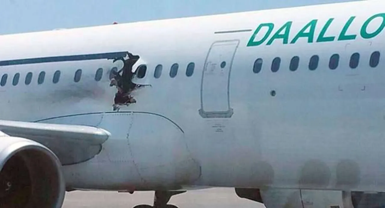 Explosion on Somalian plane 'caused by bomb'
